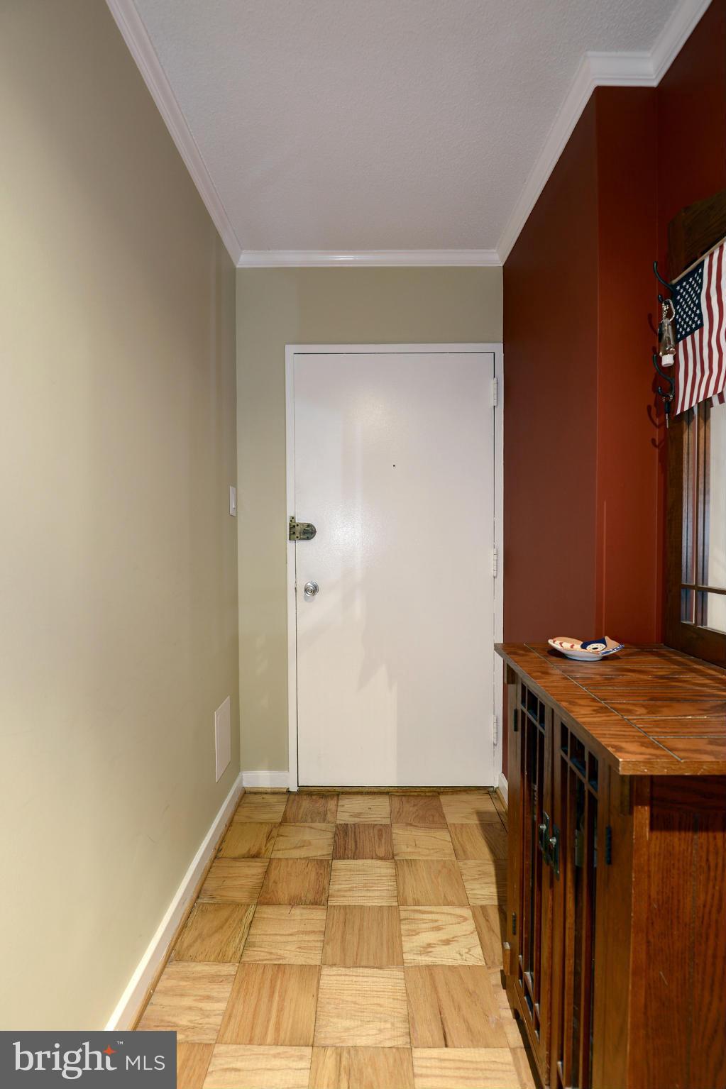 1250 4th Street Southwest, Unit W614 Washington, DC 20024 - Photo 2 of 22 a view of a livingroom with wooden floor and staircase