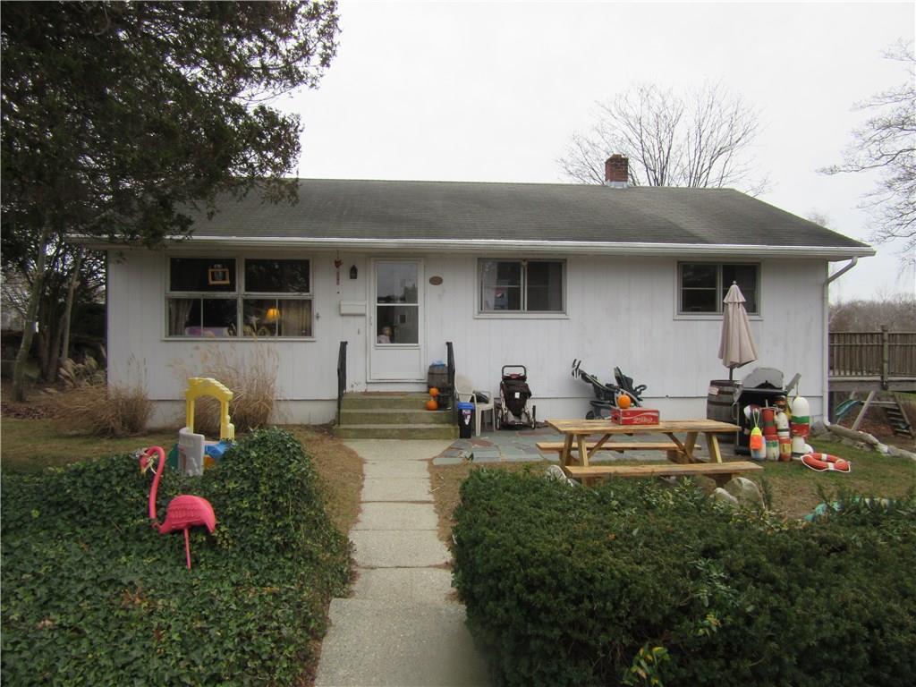 a front view of a house with patio