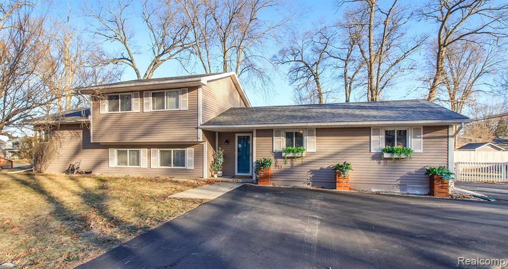 1700 Ladd Road Wolverine Lake, MI 48390 - Photo 1 of 29