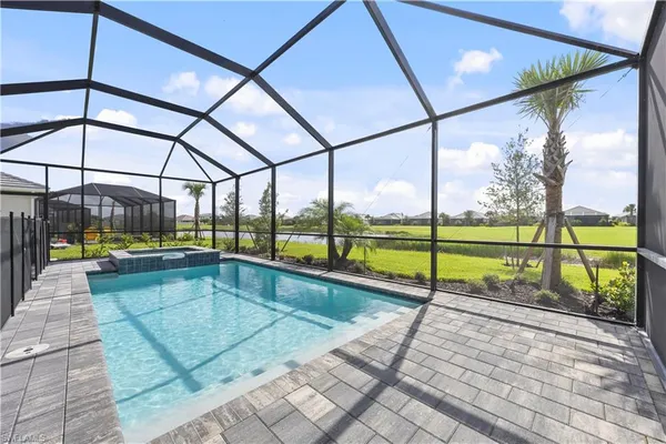 a view of a swimming pool with a porch