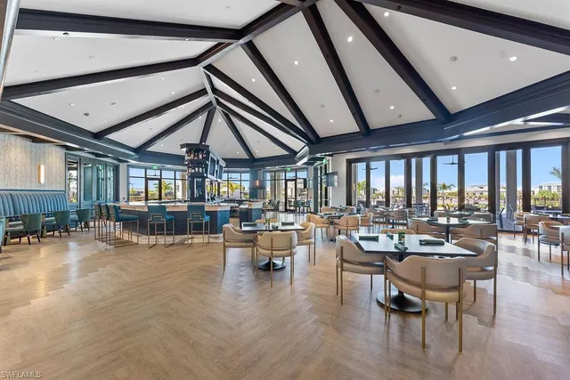 a living room with lots of furniture and white walls