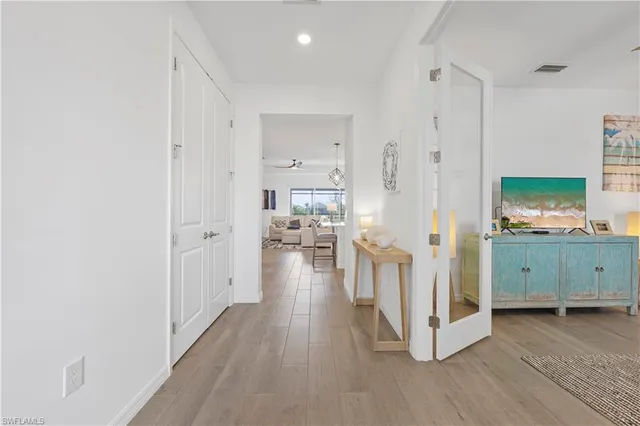 a view of a kitchen from the hallway