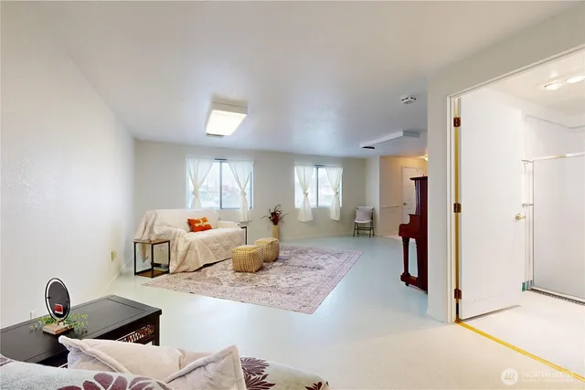 a living room with furniture and a couch