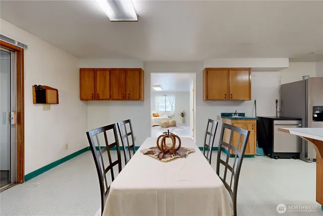 a view of a dining room with furniture