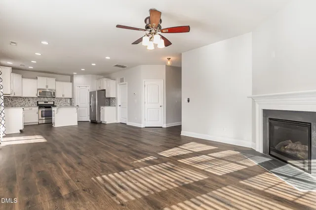 a view of kitchen with wooden floor