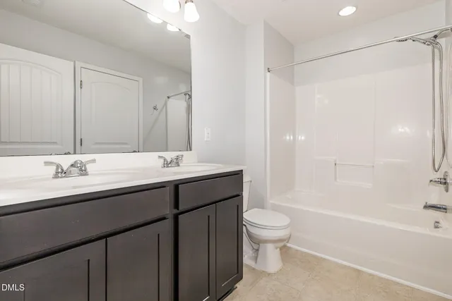 a bathroom with a bathtub and a sink