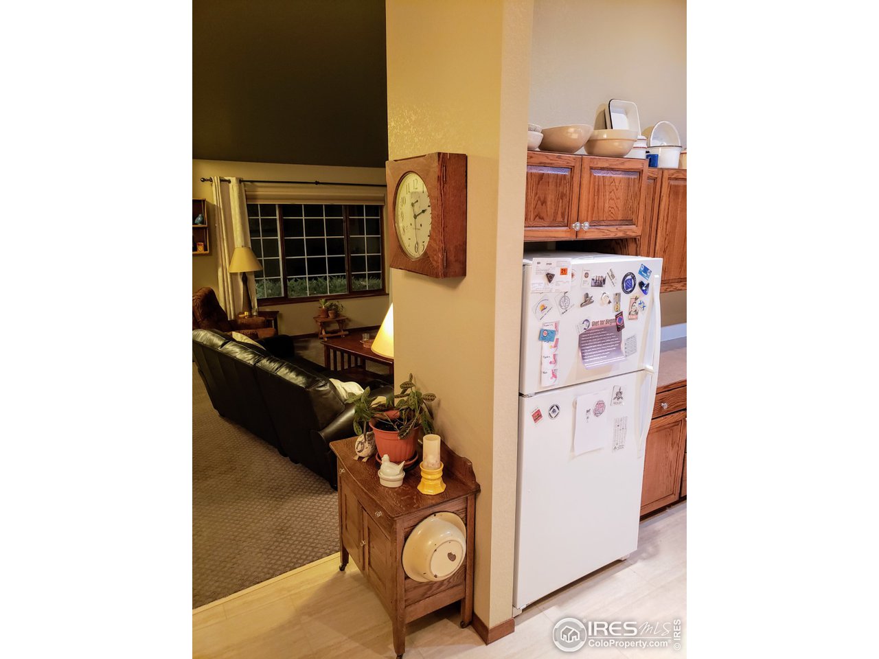 4929 10th Street Road Greeley, CO 80634 - Photo 12 of 40 Nice divide between living and kitchen space