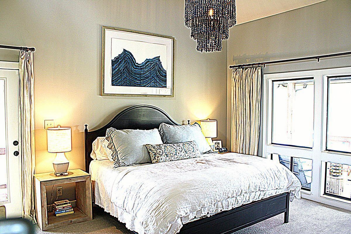 150 Turley Lane Counce, TN 38326 - Photo 13 of 37 a bedroom with a bed and a painting on the wall