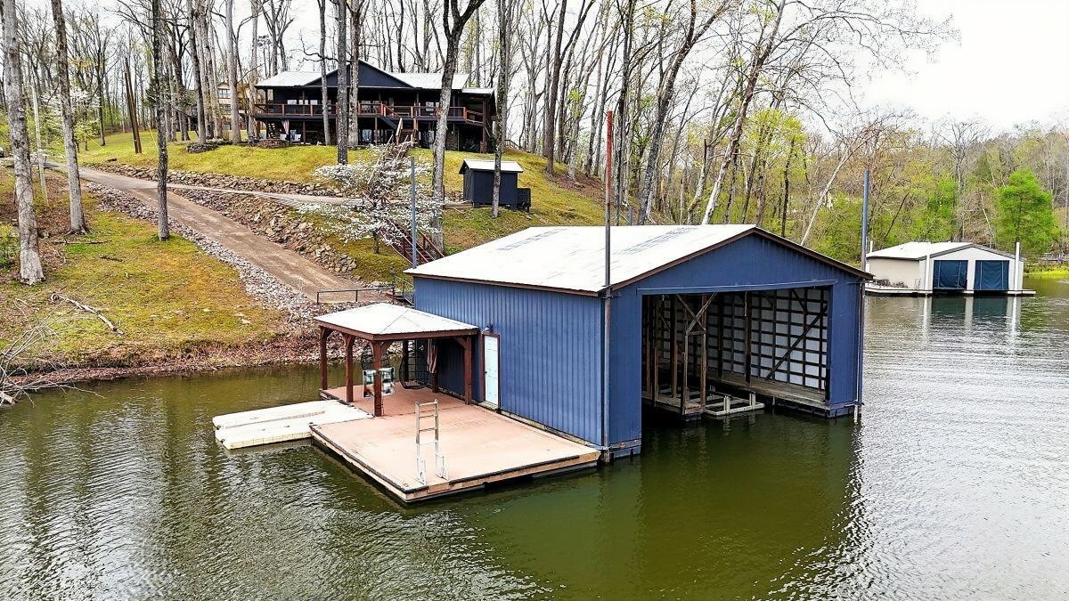 150 Turley Lane Counce, TN 38326 - Photo 2 of 37 a view of a lake with a house
