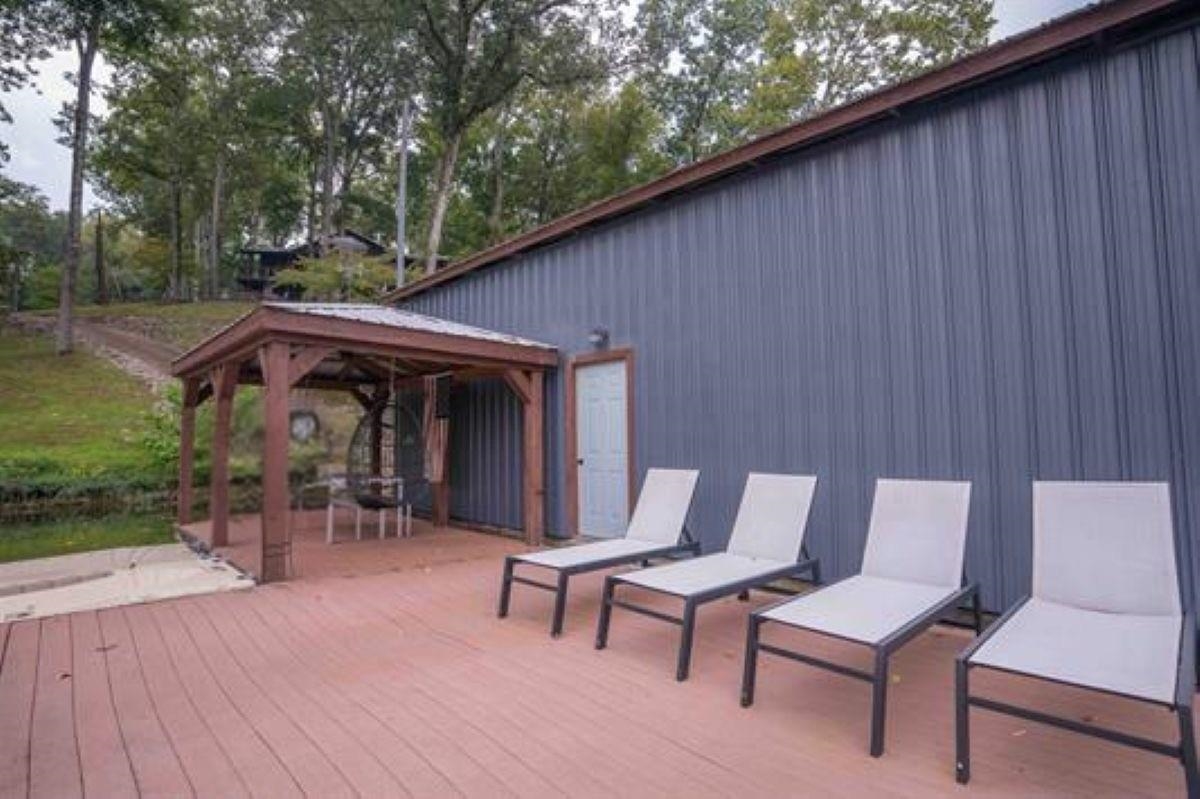 150 Turley Lane Counce, TN 38326 - Photo 7 of 37 a view of a patio with table and chairs with wooden floor and fence