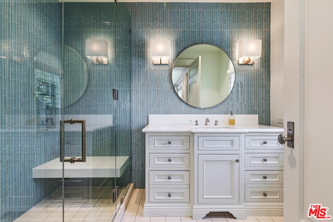 119 Malibu Colony Road Malibu, CA 90265 - Photo 15 of 24 a bathroom with a sink mirror and vanity