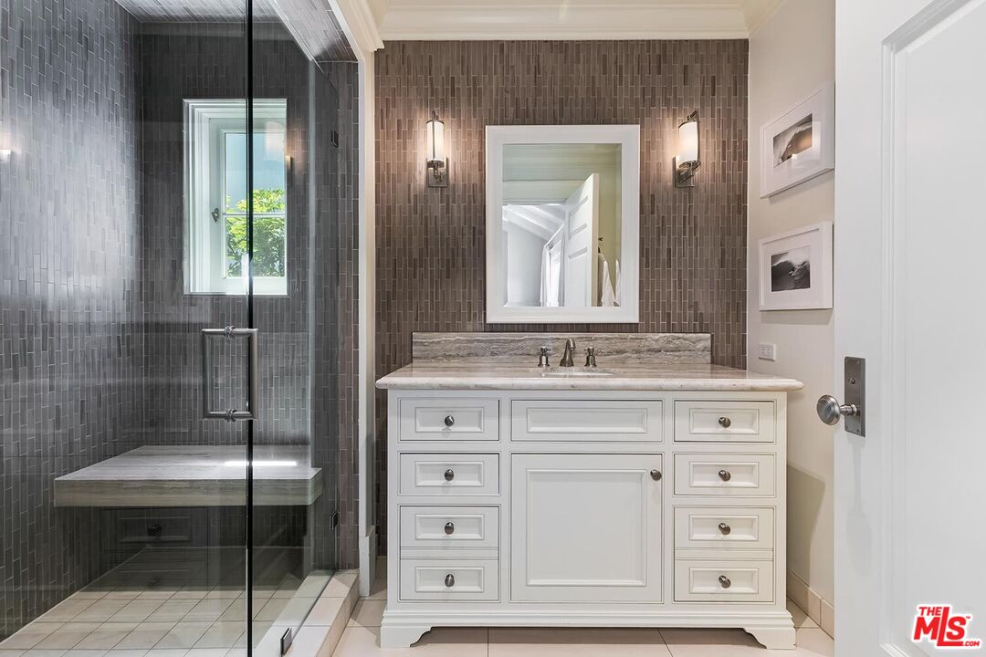 119 Malibu Colony Road Malibu, CA 90265 - Photo 19 of 24 a bathroom with a sink vanity and mirror