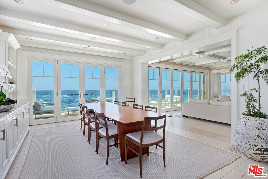 119 Malibu Colony Road Malibu, CA 90265 - Photo 7 of 24 a view of a dining room with furniture and front door