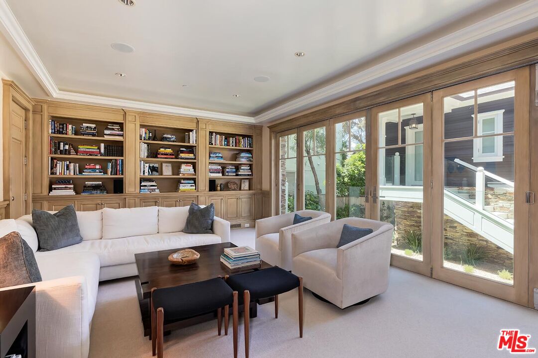 119 Malibu Colony Road Malibu, CA 90265 - Photo 10 of 24 a living room with furniture and a large window