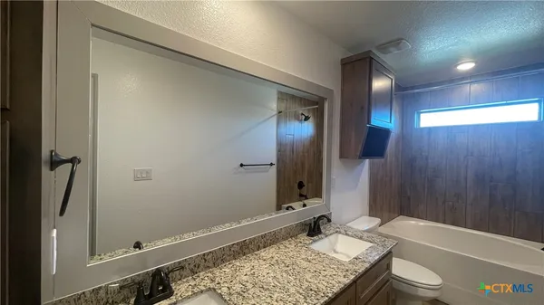 a bathroom with a bathtub