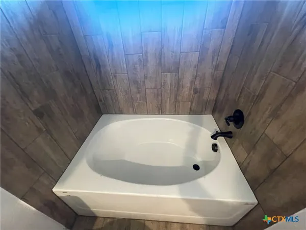 a bathroom with a bathtub