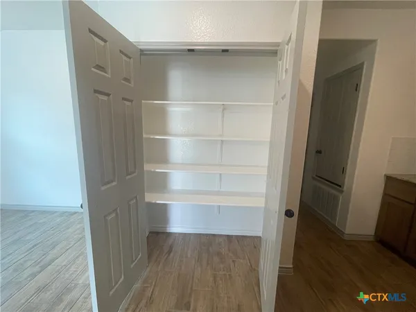 a view of a walk in closet