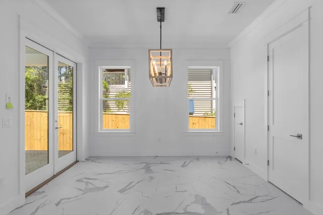 a bathroom with a shower sink and mirror