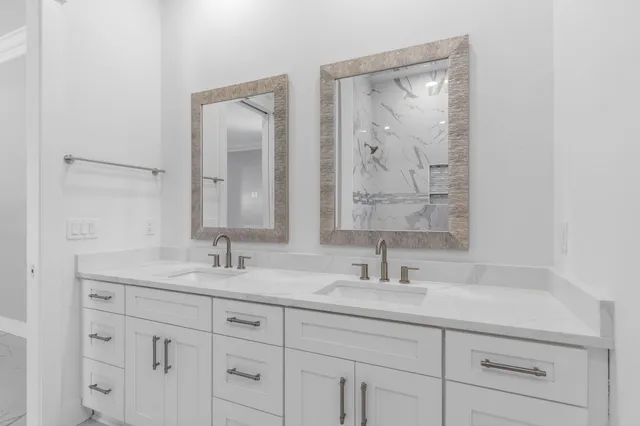 a view of a bathroom with wooden floor