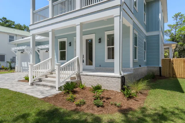 front view of a house with a yard