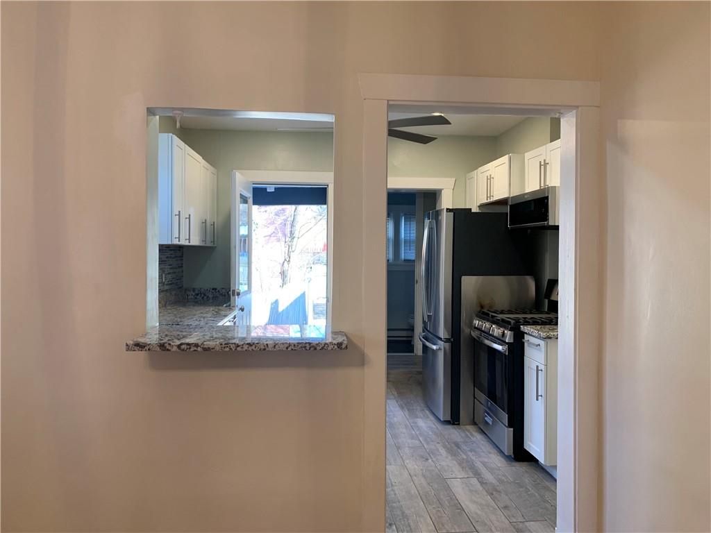 2607 Shady Avenue Pittsburgh, PA 15217 - Photo 6 of 19 a kitchen with refrigerator and window