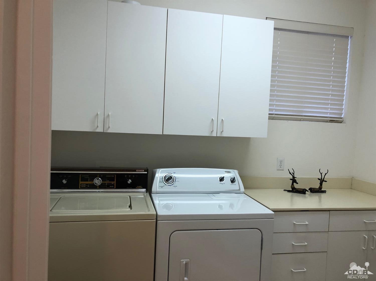 36626 Tallowood Drive Palm Desert, CA 92211 - Photo 15 of 17 a view of washer and dryer