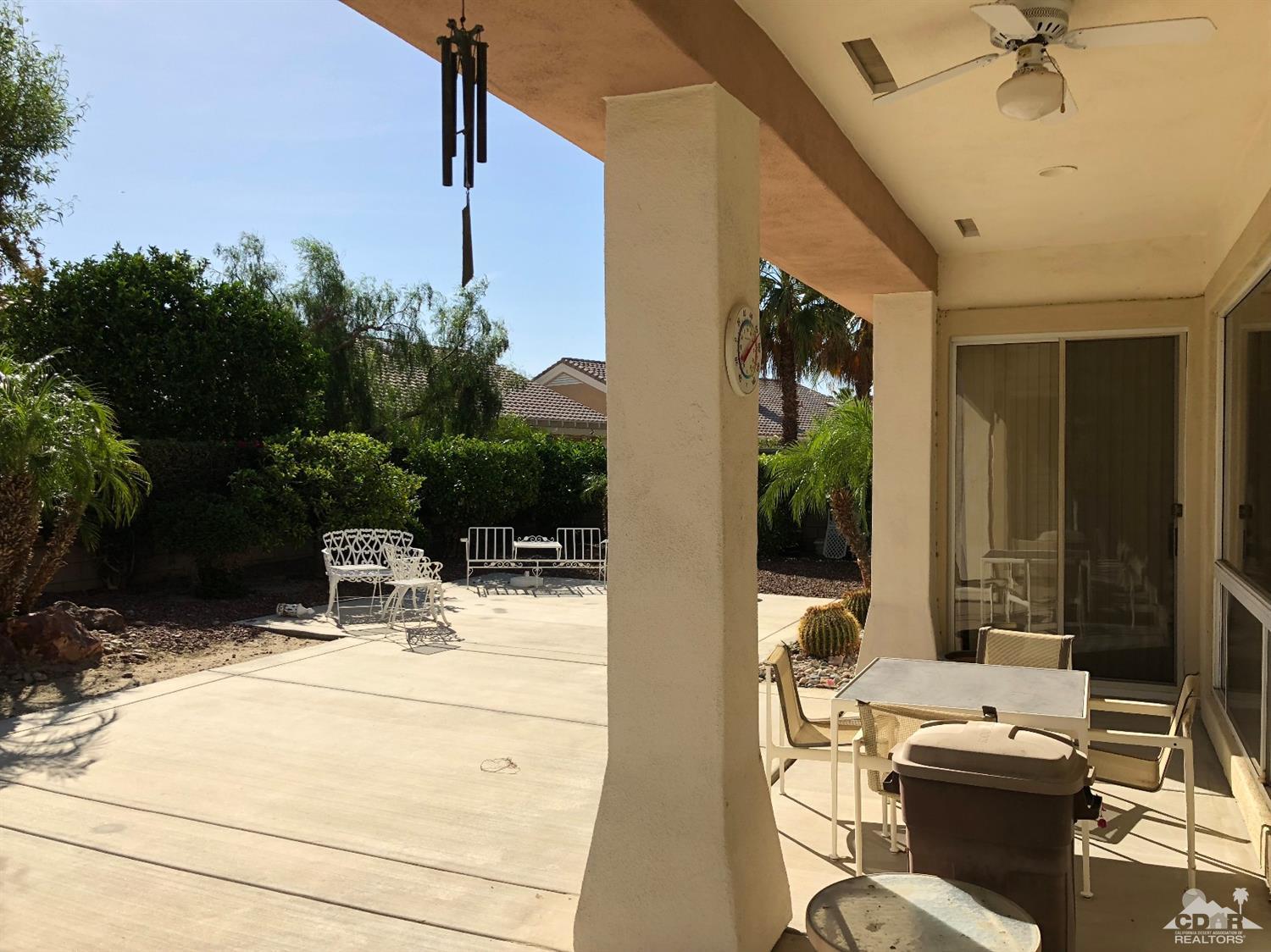 36626 Tallowood Drive Palm Desert, CA 92211 - Photo 16 of 17 a view of balcony with potted plant and outdoor seating