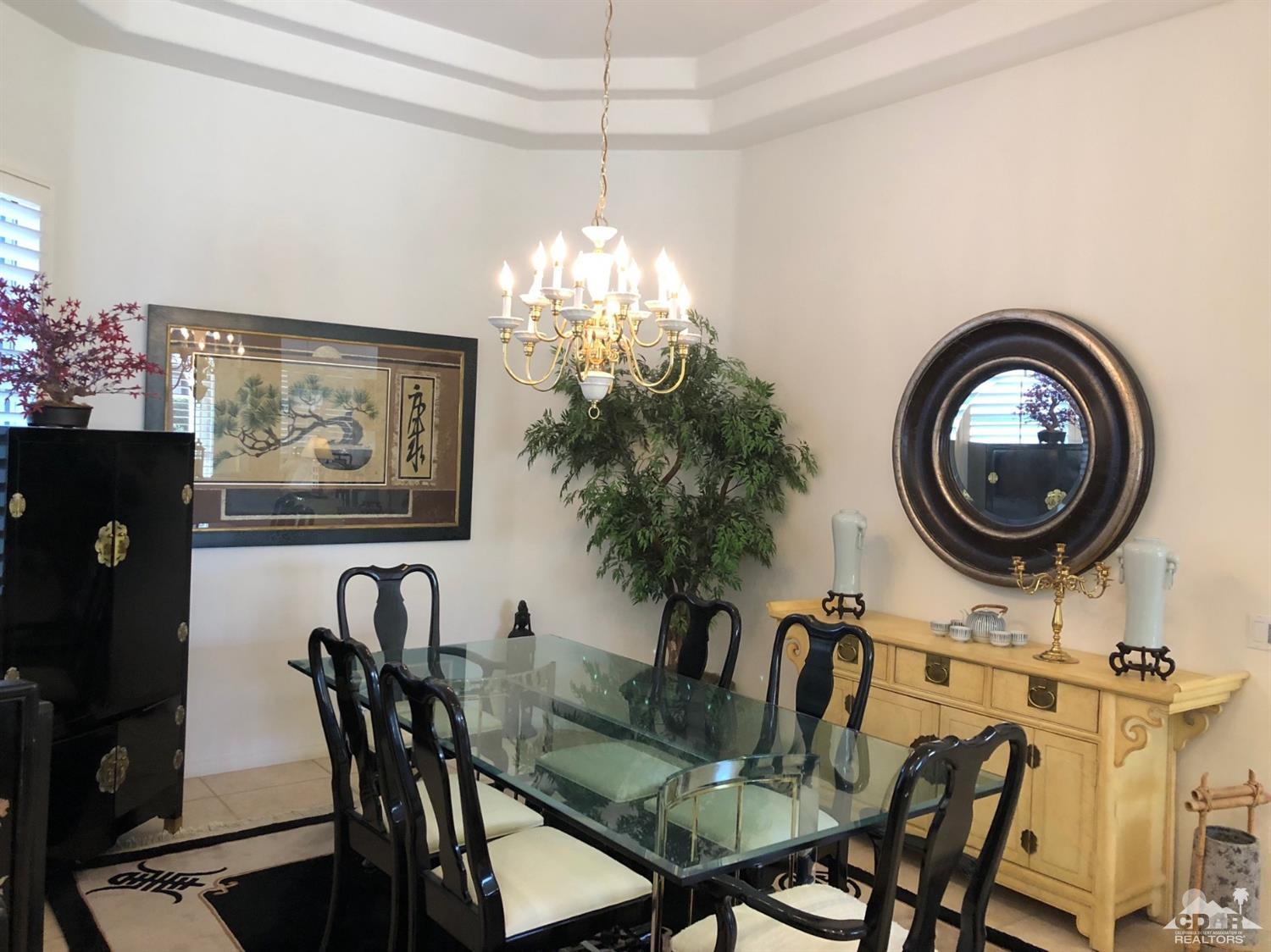 36626 Tallowood Drive Palm Desert, CA 92211 - Photo 4 of 17 a dining room with furniture and window