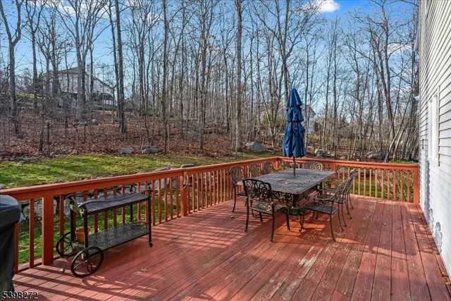 a view of a chairs and table on the wooden floor