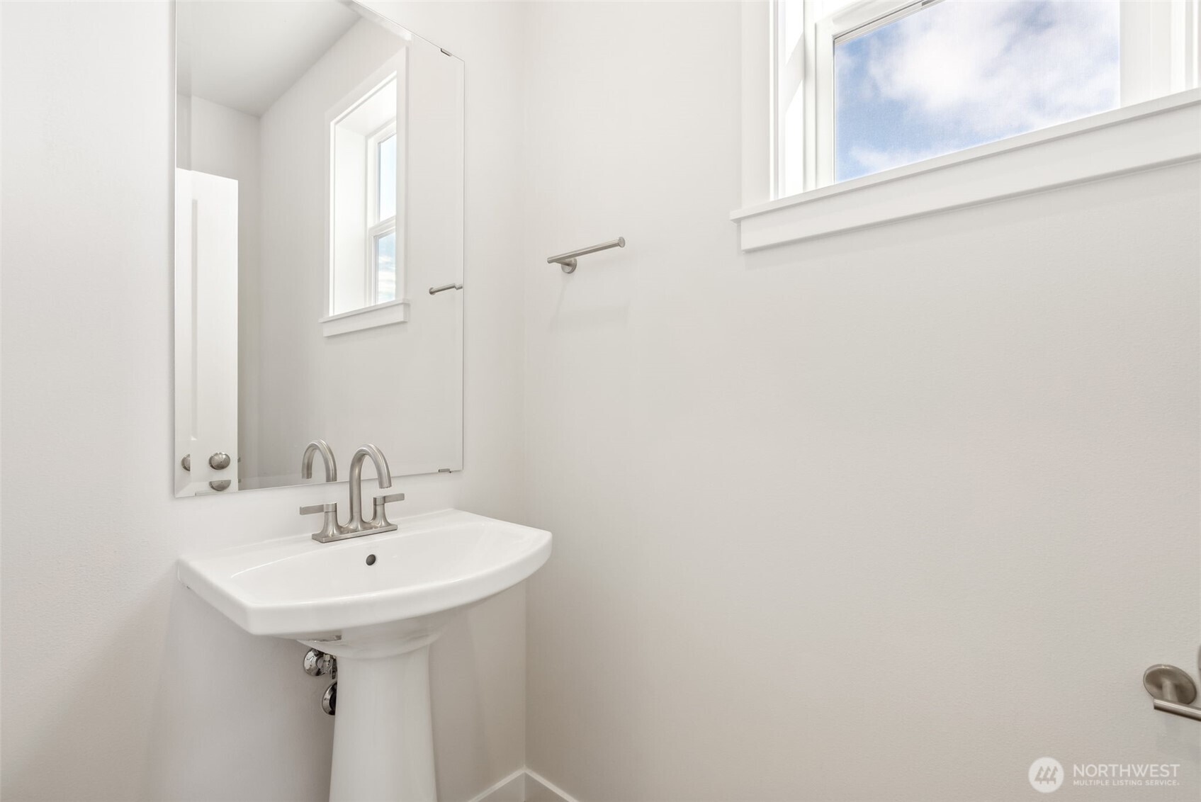 2064 Northeast Norseman Way Poulsbo, WA 98370 - Photo 16 of 28 a bathroom with a sink and a mirror
