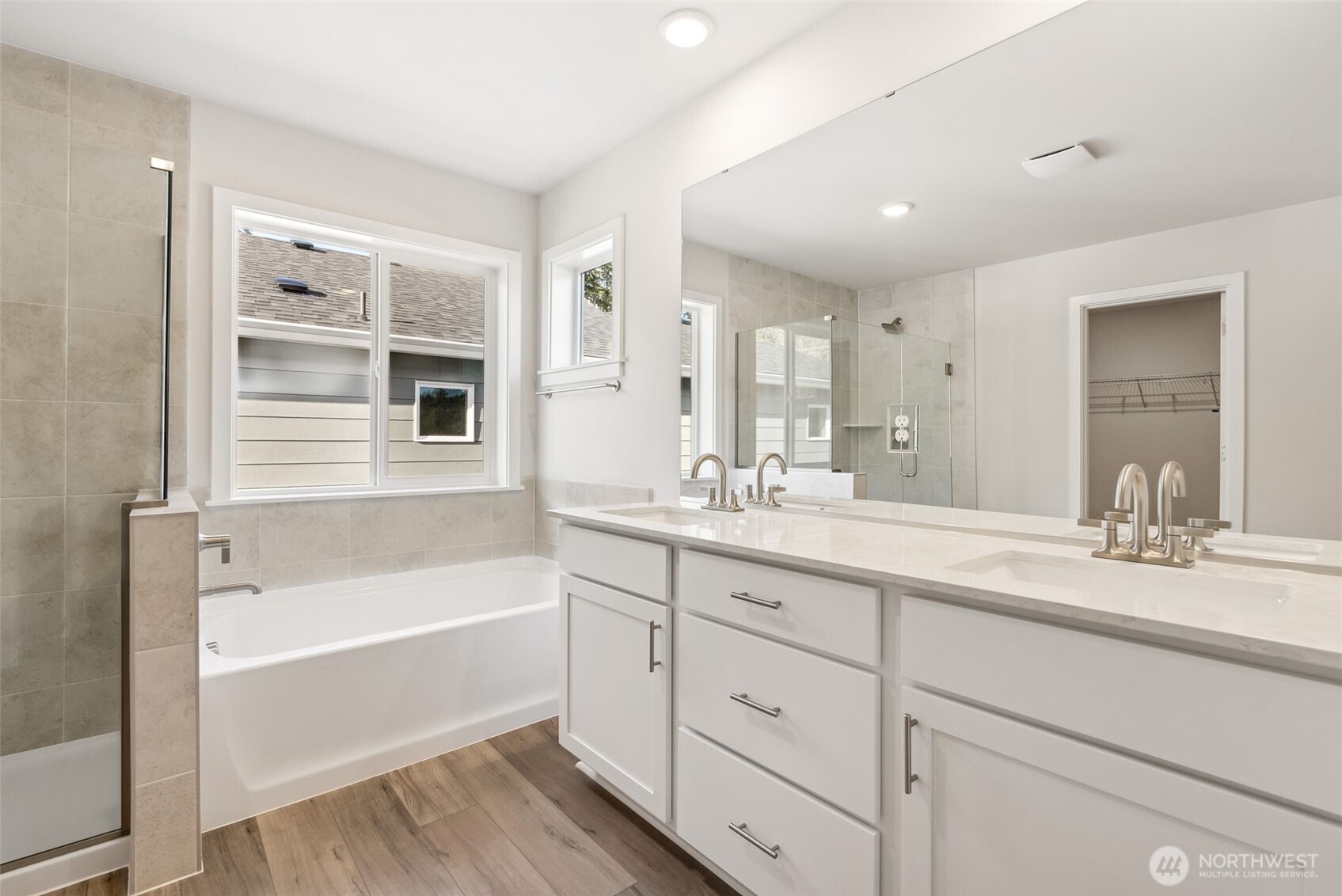 2064 Northeast Norseman Way Poulsbo, WA 98370 - Photo 22 of 28 a bathroom with a tub sink and mirror