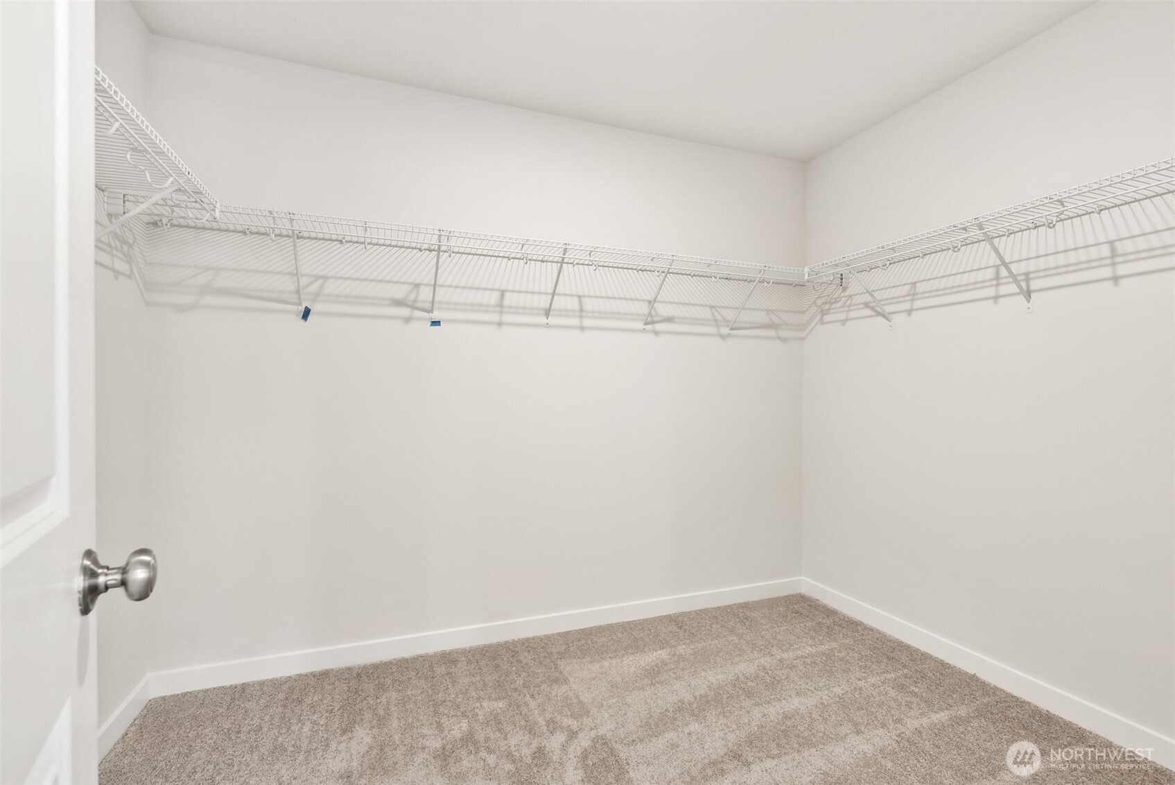 2064 Northeast Norseman Way Poulsbo, WA 98370 - Photo 24 of 28 a view of a room with racks on the wall