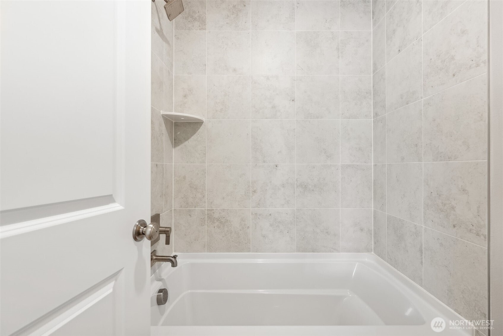 2064 Northeast Norseman Way Poulsbo, WA 98370 - Photo 26 of 28 a close up of a bathtub curtain