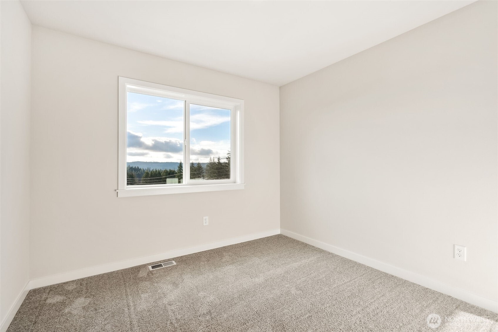 2064 Northeast Norseman Way Poulsbo, WA 98370 - Photo 27 of 28 an empty room with a window
