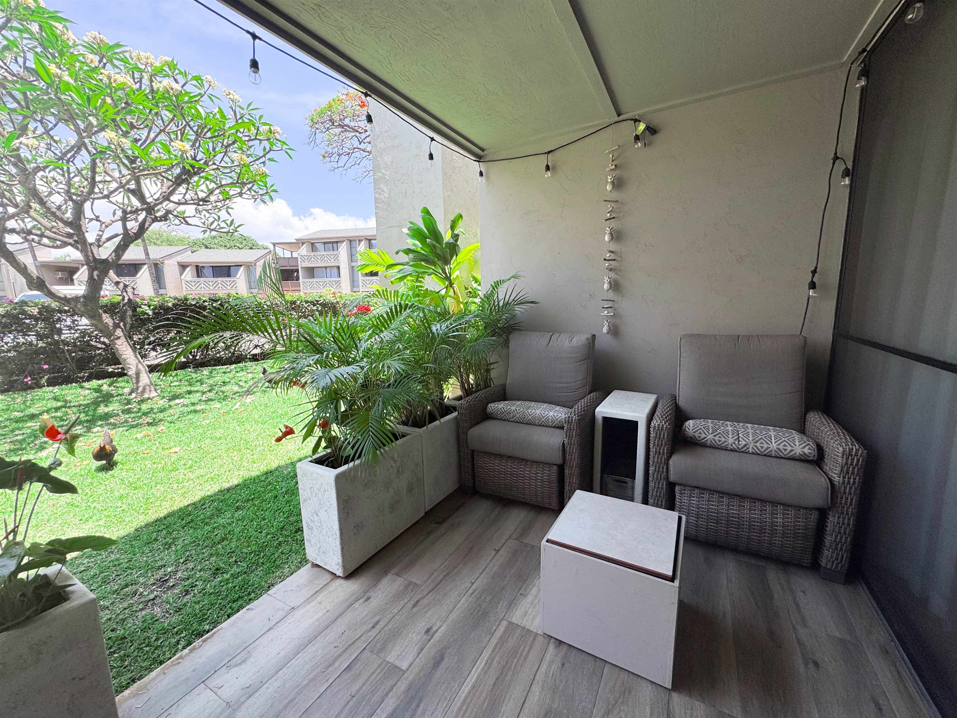 483 South Kihei Road, Unit 115 Kihei, HI 96753 - Photo 20 of 36 a view of a patio with couches and potted plants