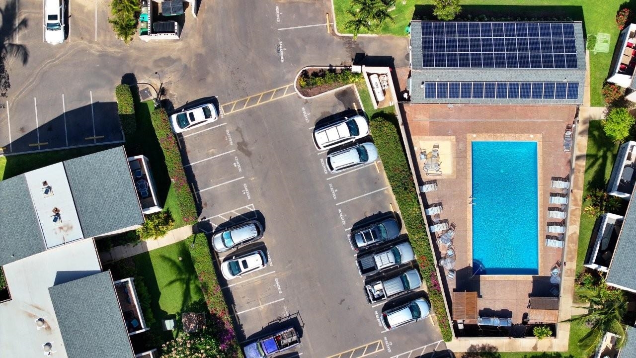 483 South Kihei Road, Unit 115 Kihei, HI 96753 - Photo 31 of 36 an aerial view of residential houses with outdoor space and parking