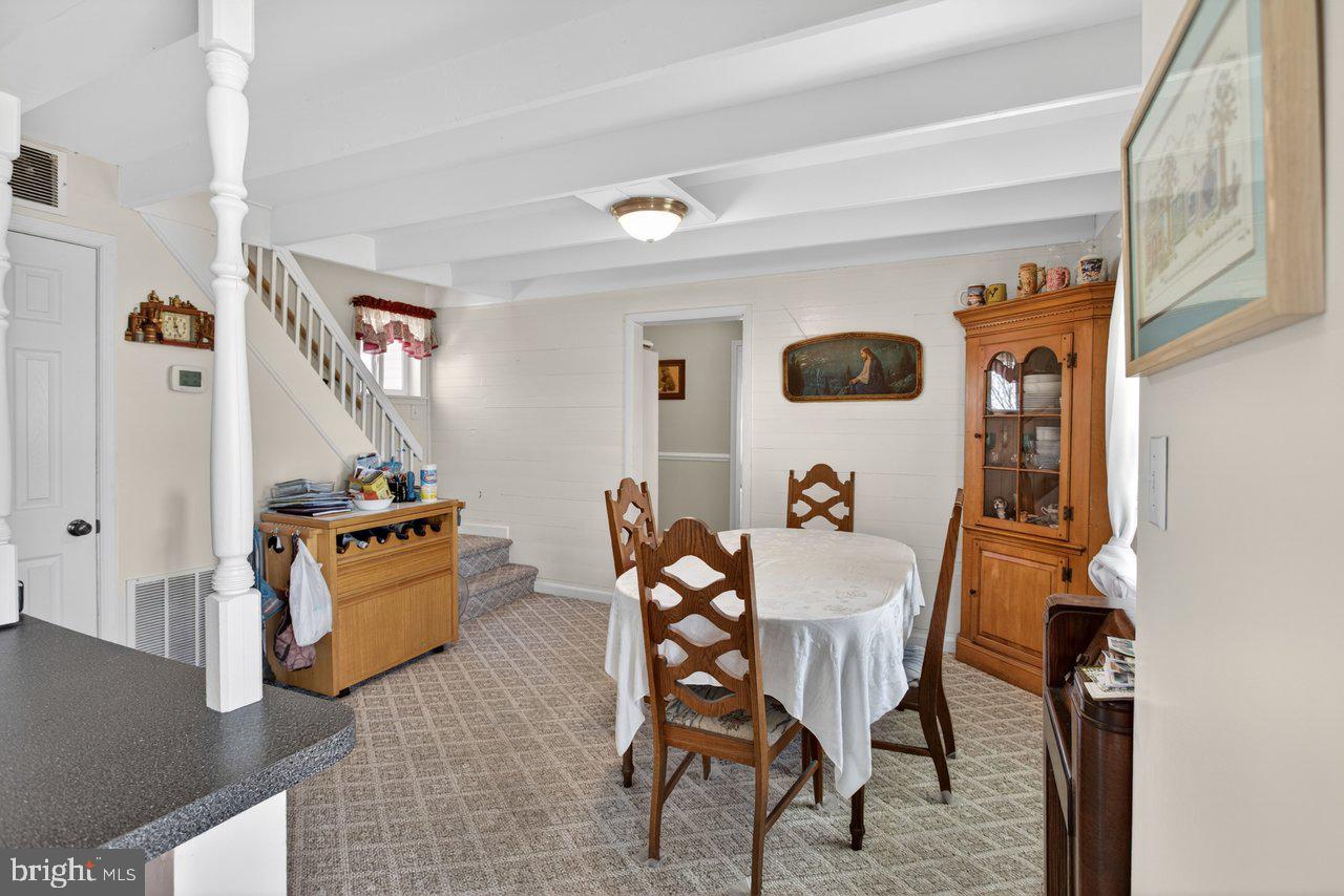 1751 Orchard Road Mount Jackson, VA 22842 - Photo 5 of 30 a dining room with furniture and wooden floor