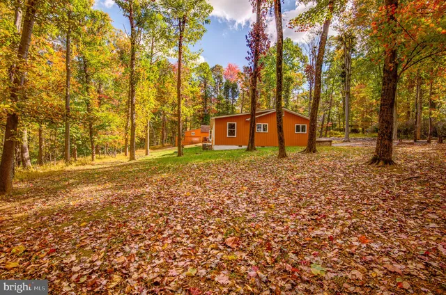 a sign board in front of a building