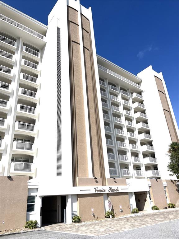 633 Alhambra Road, Unit 703 Venice, FL 34285 - Photo 2 of 15 a view of a tall building