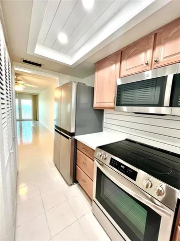 a view of sink and window in a living room