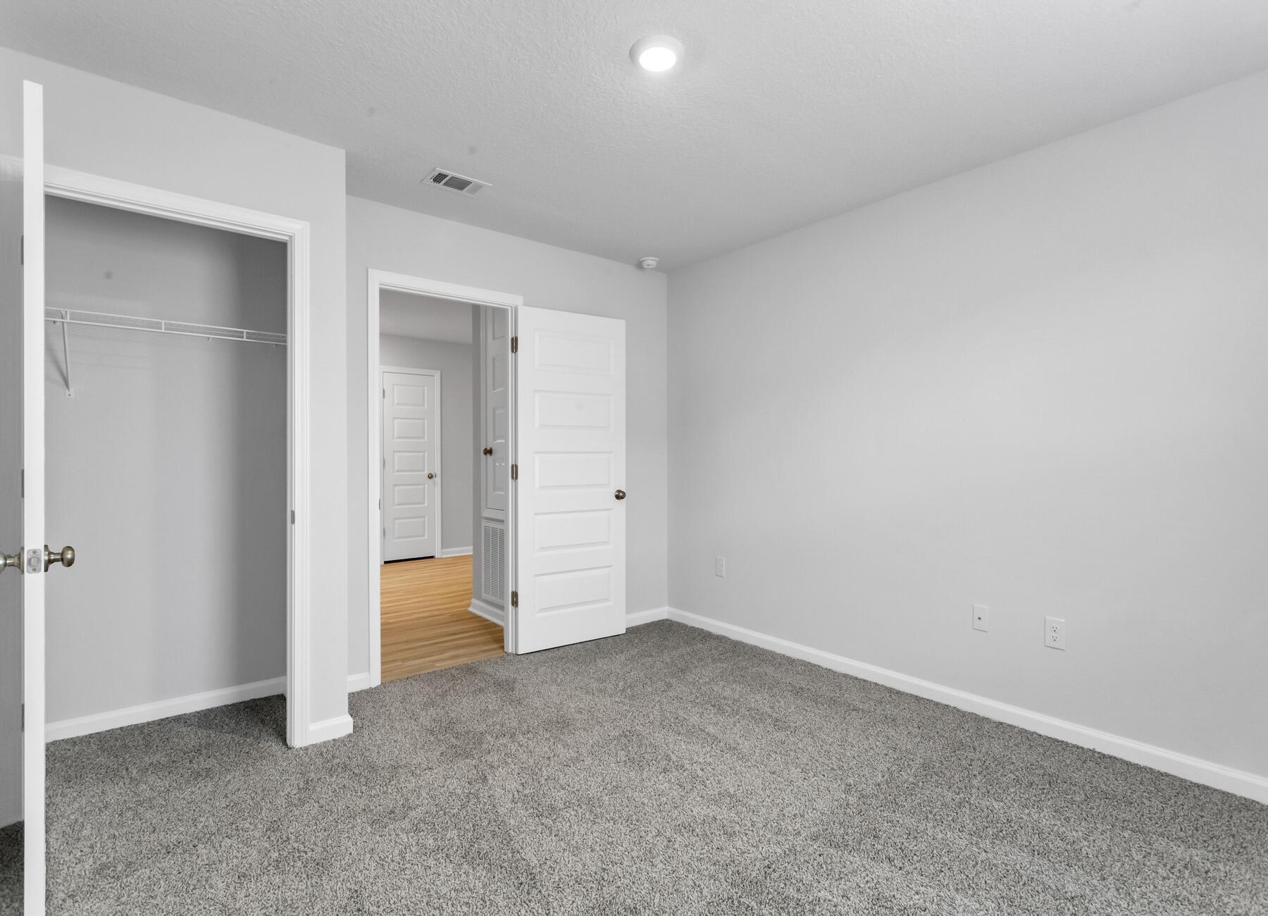 839 Otto Loop Crestview, FL 32539 - Photo 14 of 34 an empty room with an entrance and shower