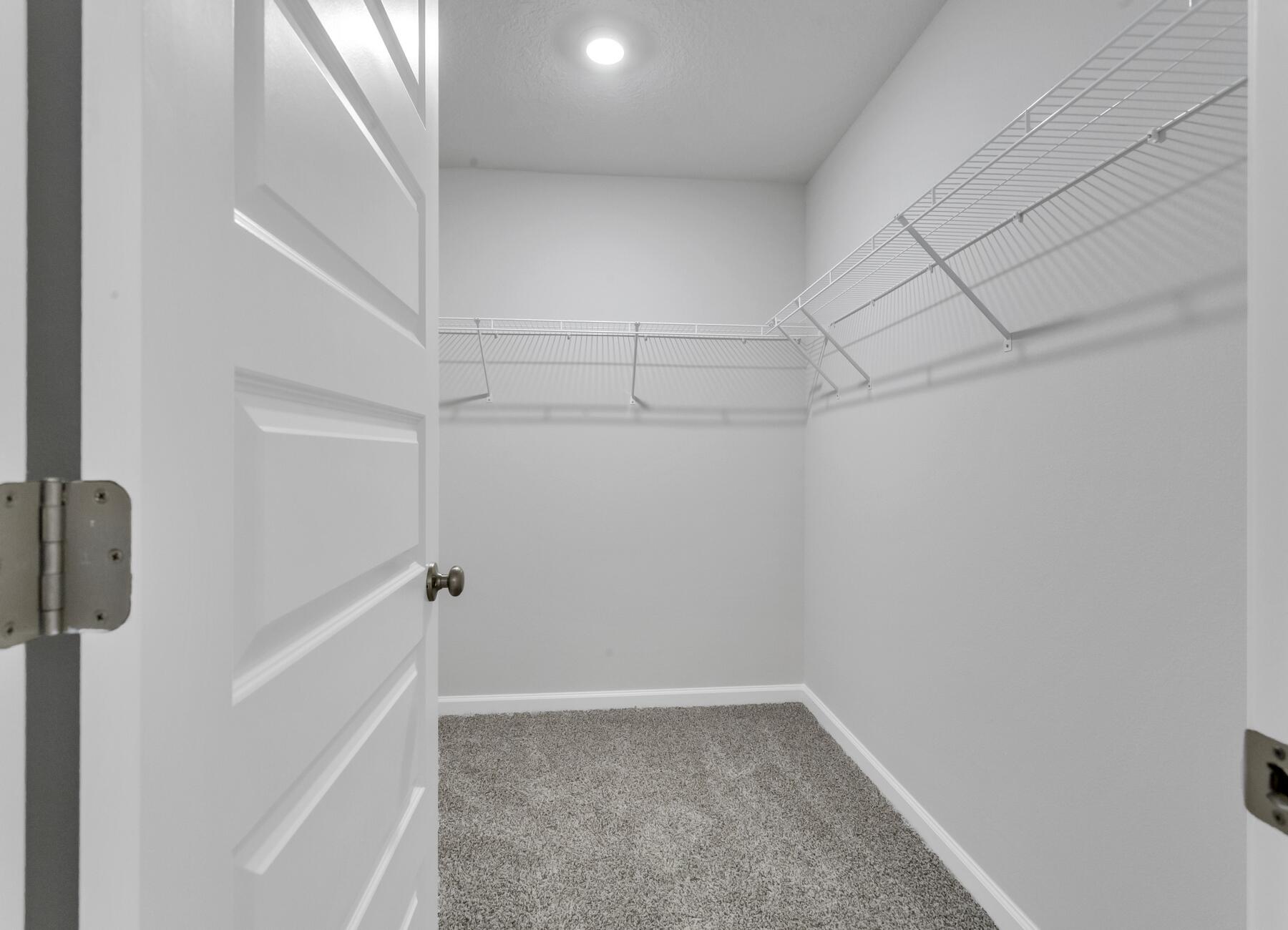 839 Otto Loop Crestview, FL 32539 - Photo 28 of 34 a view of a room with racks on the wall