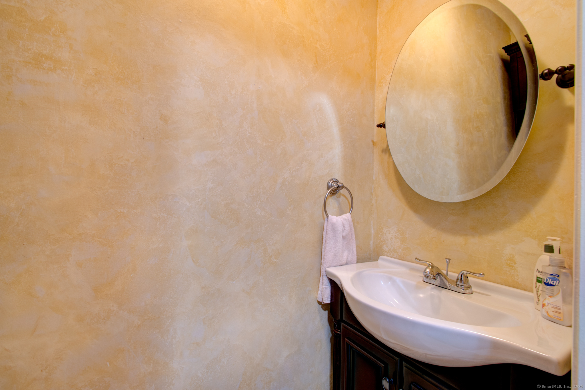 184 Gravel Street, Unit 26 Meriden, CT 06450 - Photo 13 of 27 a bathroom with a sink and a mirror