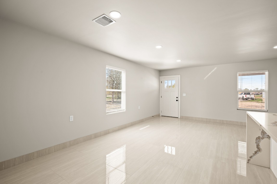 183 Mimosa Road Dale, TX 78616 - Photo 8 of 32 a view of an empty room with a window