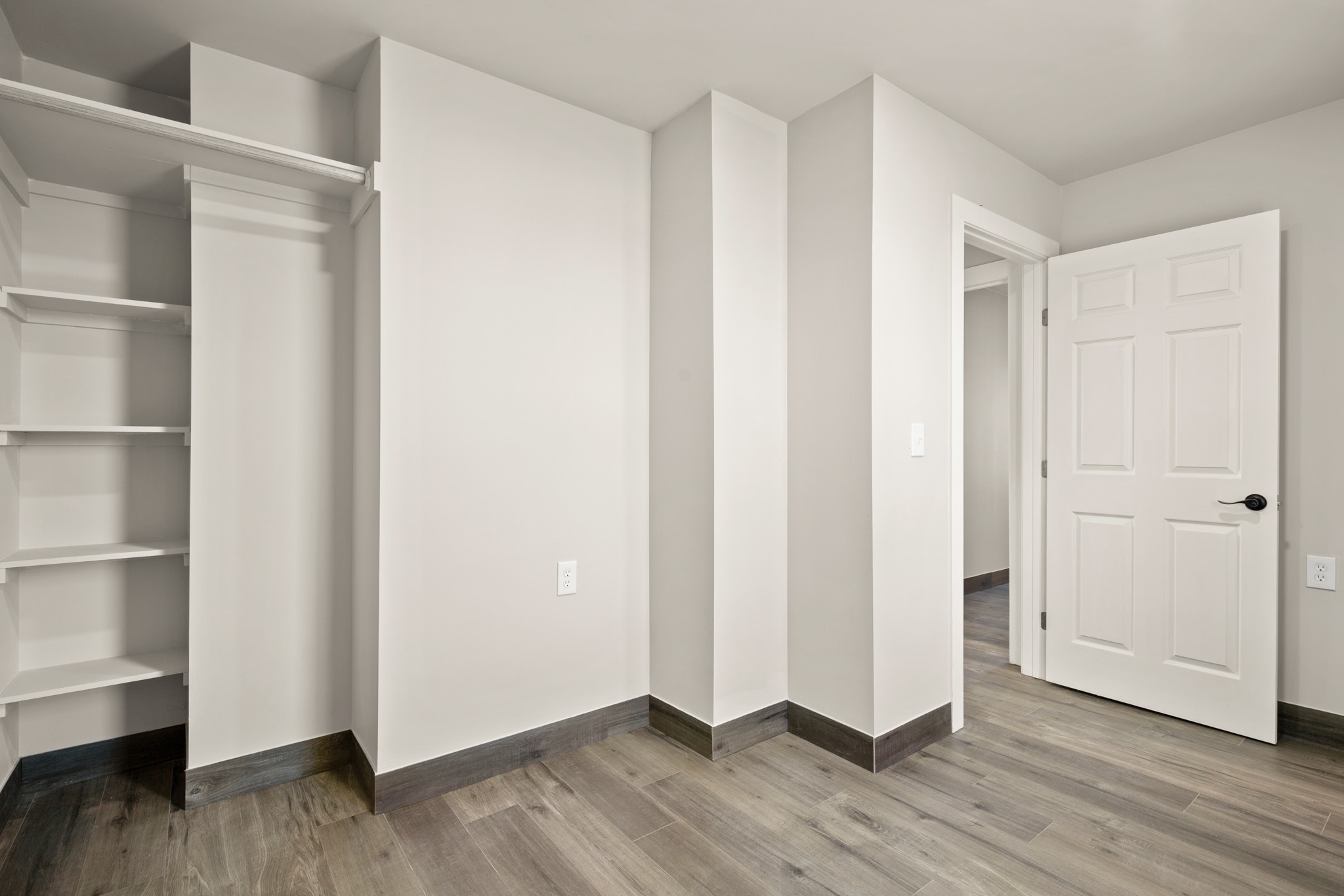 183 Mimosa Road Dale, TX 78616 - Photo 11 of 32 a view of an empty room with wooden floor