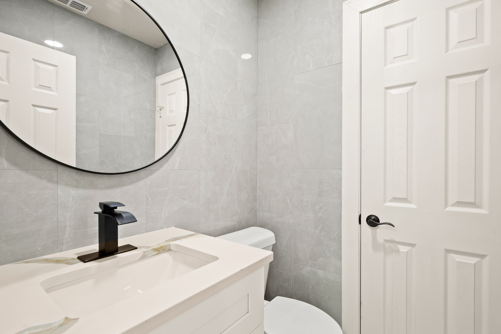183 Mimosa Road Dale, TX 78616 - Photo 12 of 32 a bathroom with a sink and a mirror