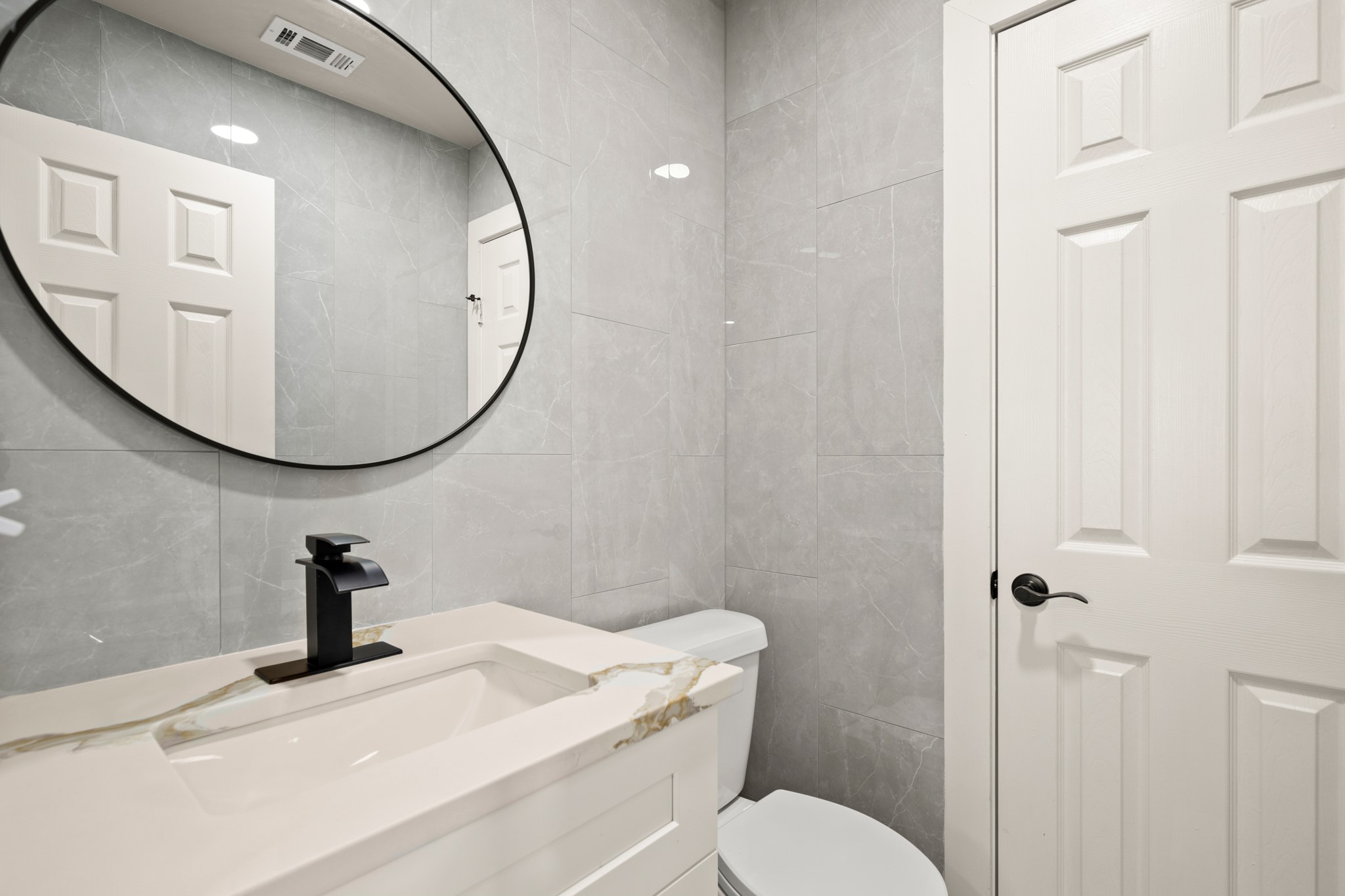 183 Mimosa Road Dale, TX 78616 - Photo 23 of 32 a bathroom with a sink mirror and toilet
