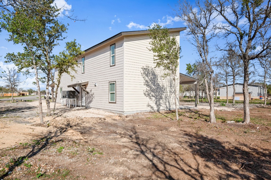 183 Mimosa Road Dale, TX 78616 - Photo 25 of 32 a view of a house with a yard