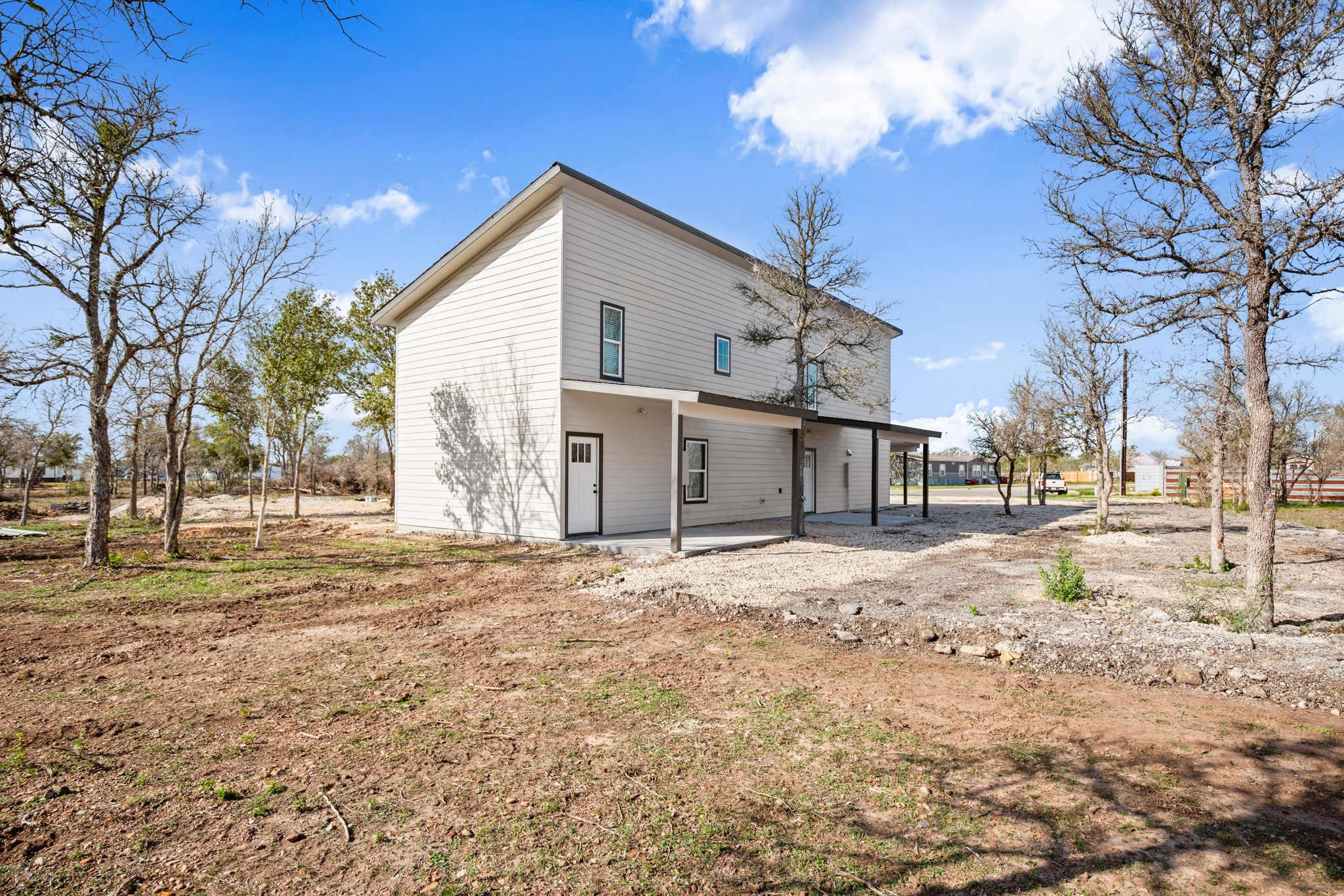 183 Mimosa Road Dale, TX 78616 - Photo 26 of 32 a view of road with large trees