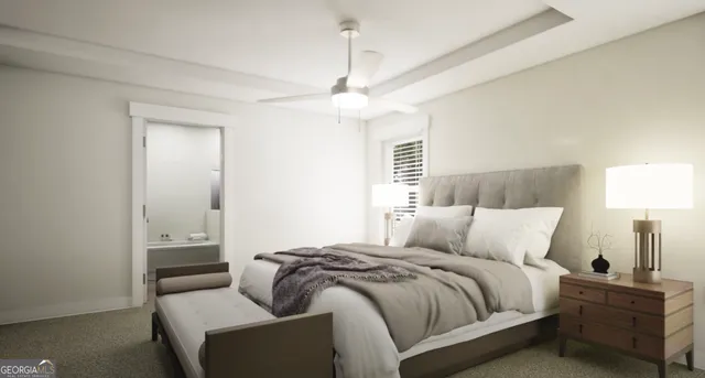 a bedroom with a bed and a night stand